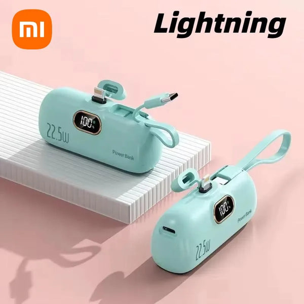 Two green power banks with digital displays on a pink background, featuring the Xiaomi logo.