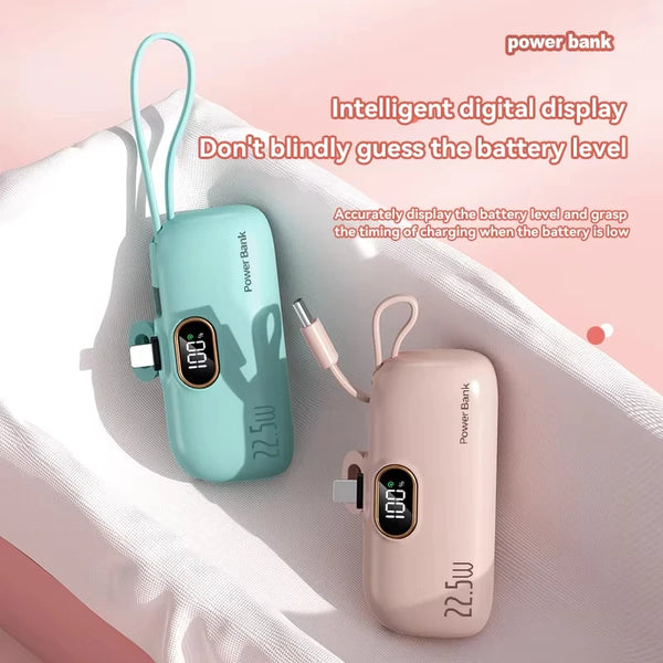 Two power banks, one green and one pink, with digital displays on a light pink background.