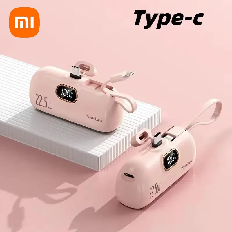 Two pink power banks with digital displays on a light pink background, featuring the Xiaomi logo.