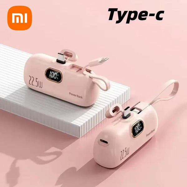 Two pink power banks with digital displays on a light pink background, featuring the Xiaomi logo.