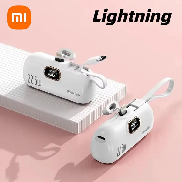Two power banks with digital displays on a pink background, featuring the Xiaomi logo.