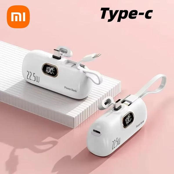 Two white power banks with digital displays on a pink background, featuring the Xiaomi logo.