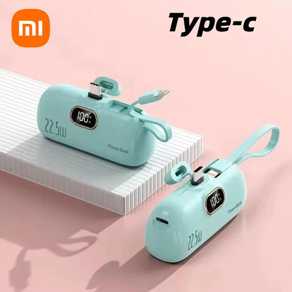 Two green power banks with digital displays on a pink background, featuring the Xiaomi logo.