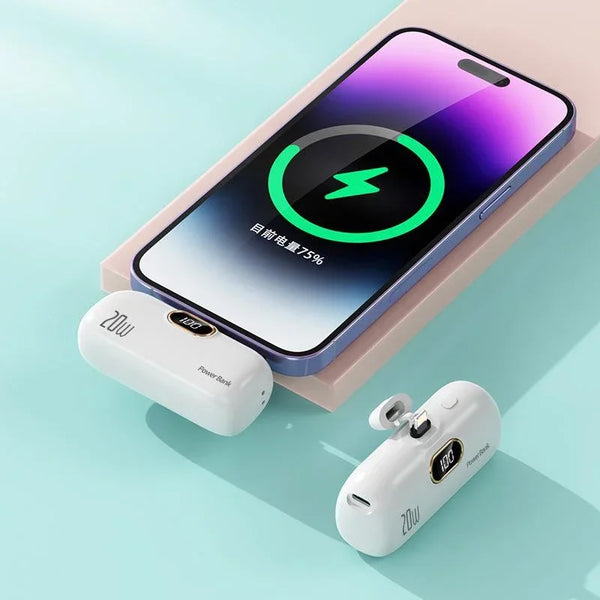 Phone with white wireless charger on a light blue background
