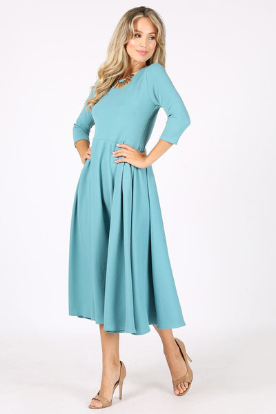 1223. Midi dress with a round neckline, side pockets, pleated bodice. - Regeneration Zone